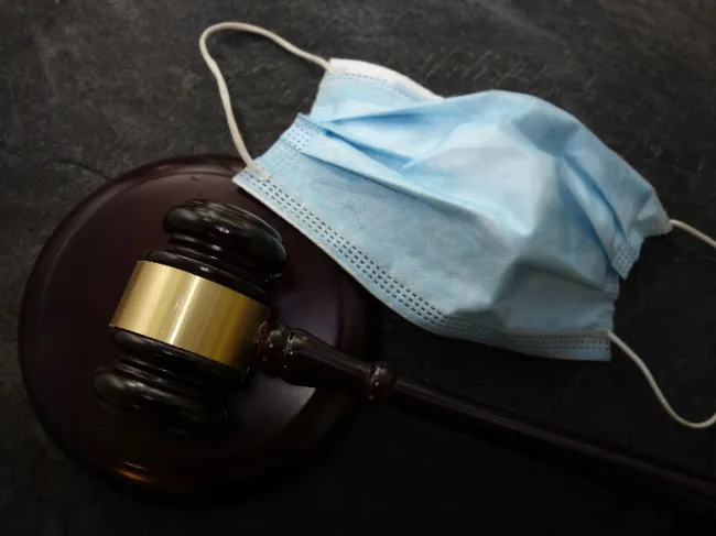 covid mask and judge gavel